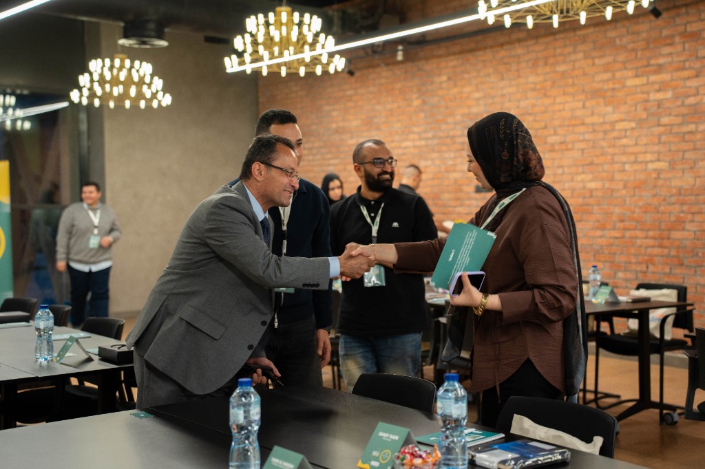 Prof. Hazem Halim shaking hands