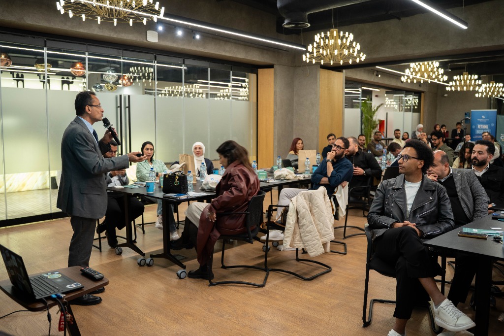 Dr. Hazem Halim speaking to audience